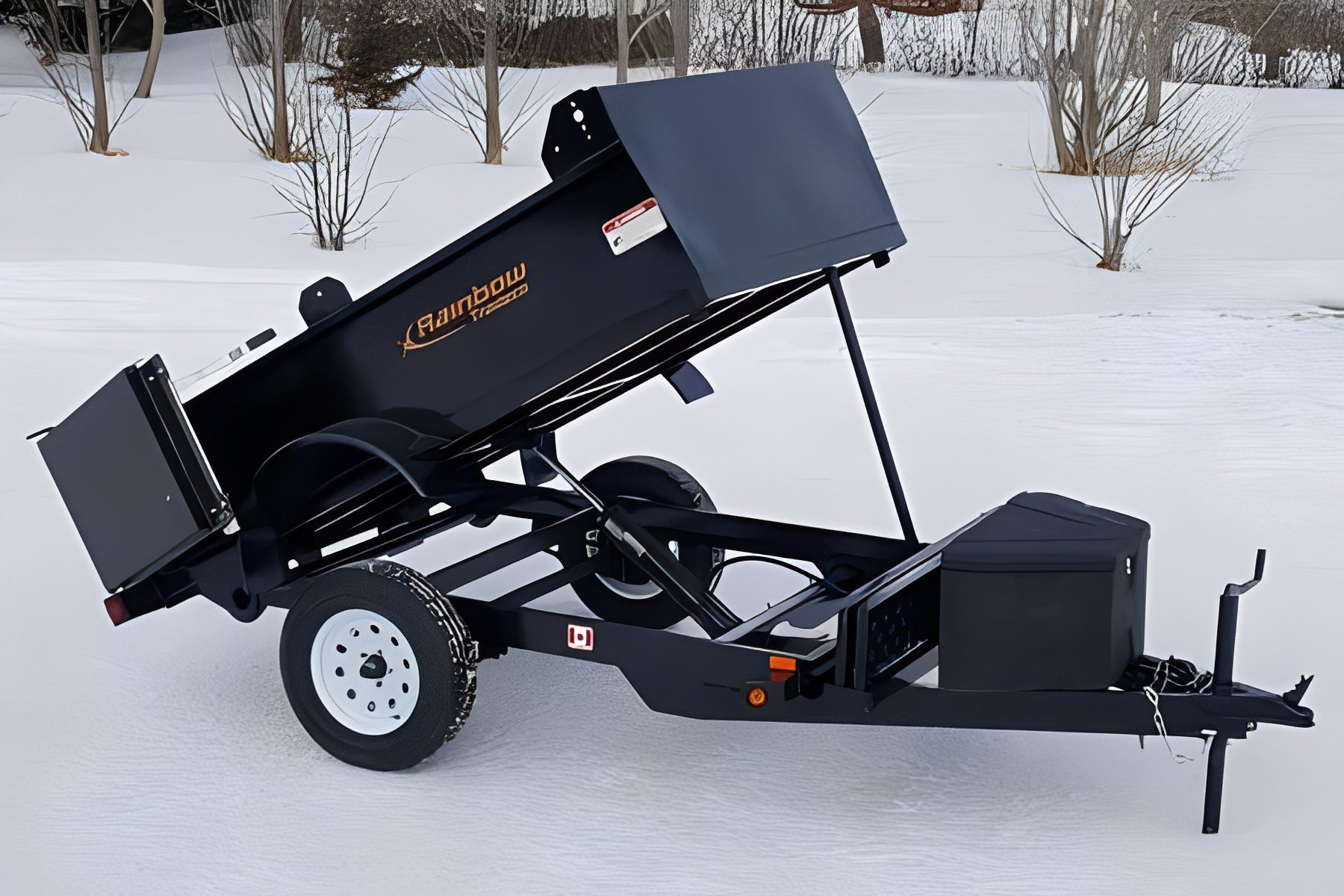 Utility trailer in snowy landscape
