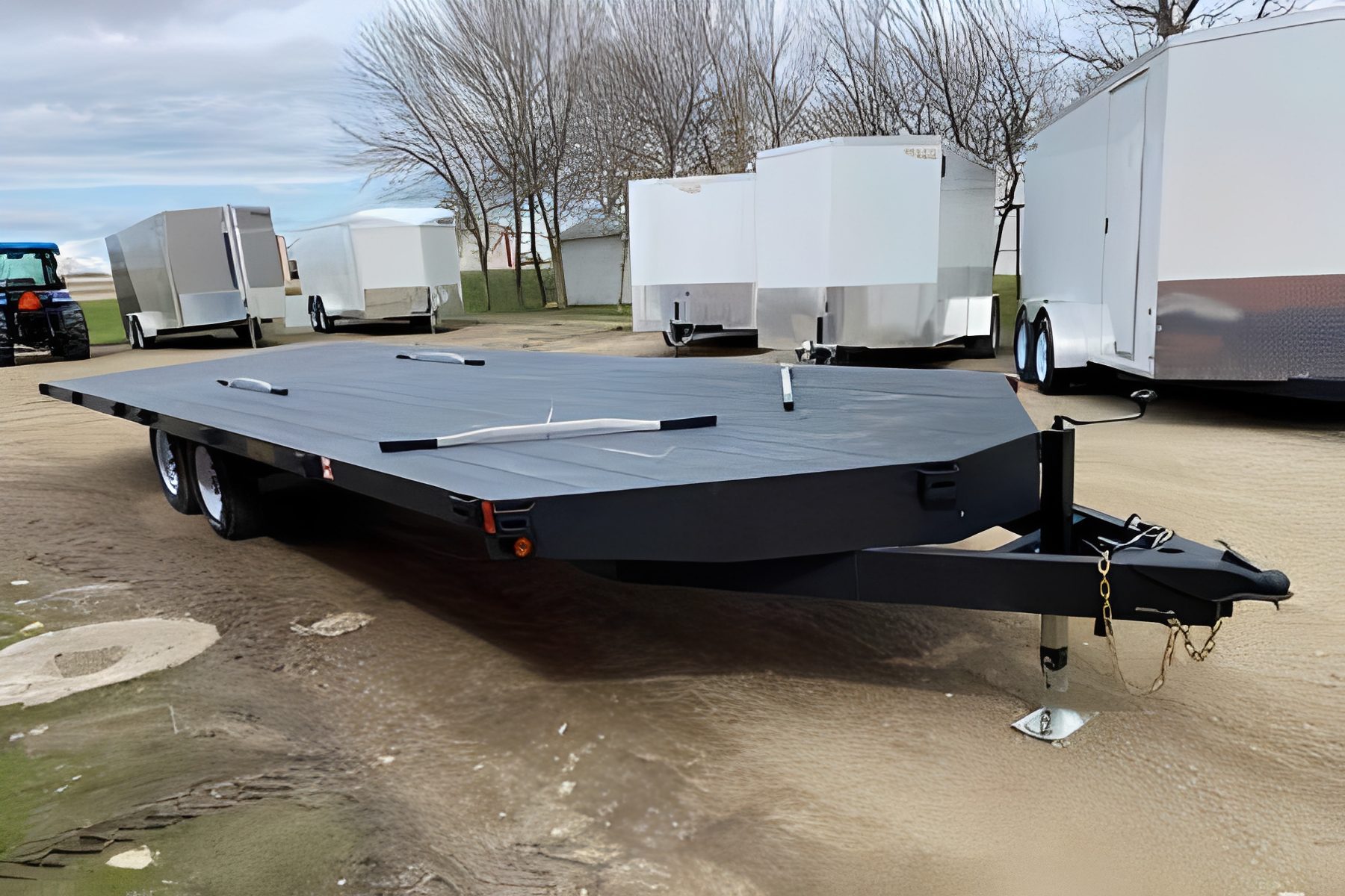 Black flatbed trailer with dual axles