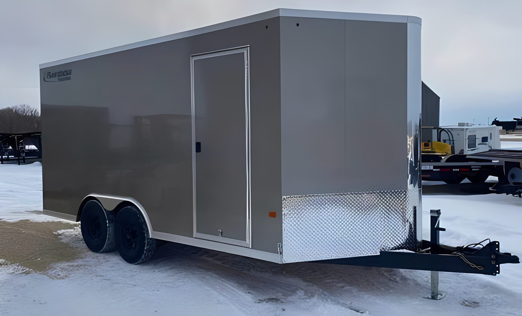 Enclosed trailer on snowy ground