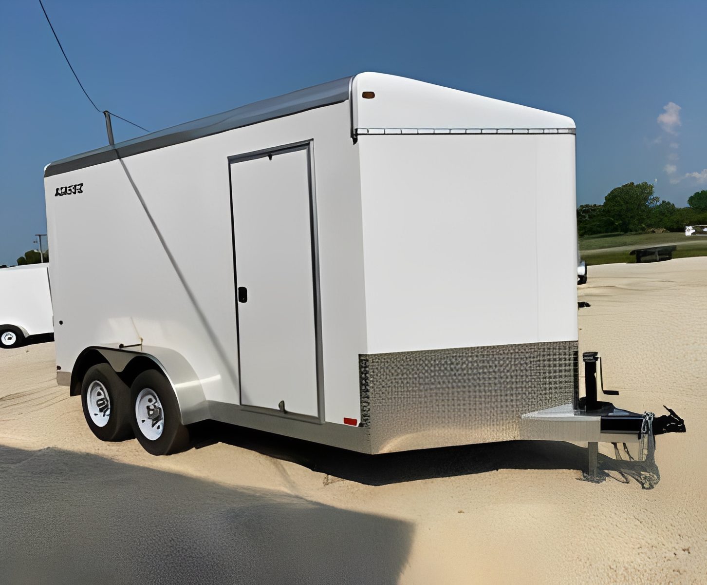 Side view of a white utility trailer