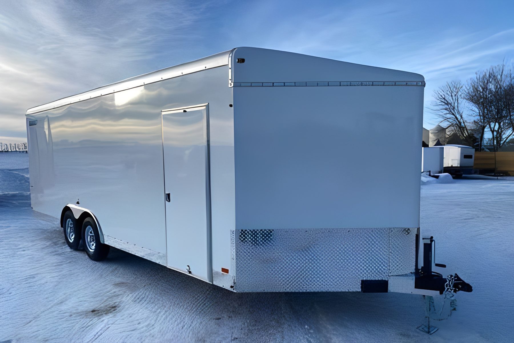 Enclosed trailer with dual axles in snow