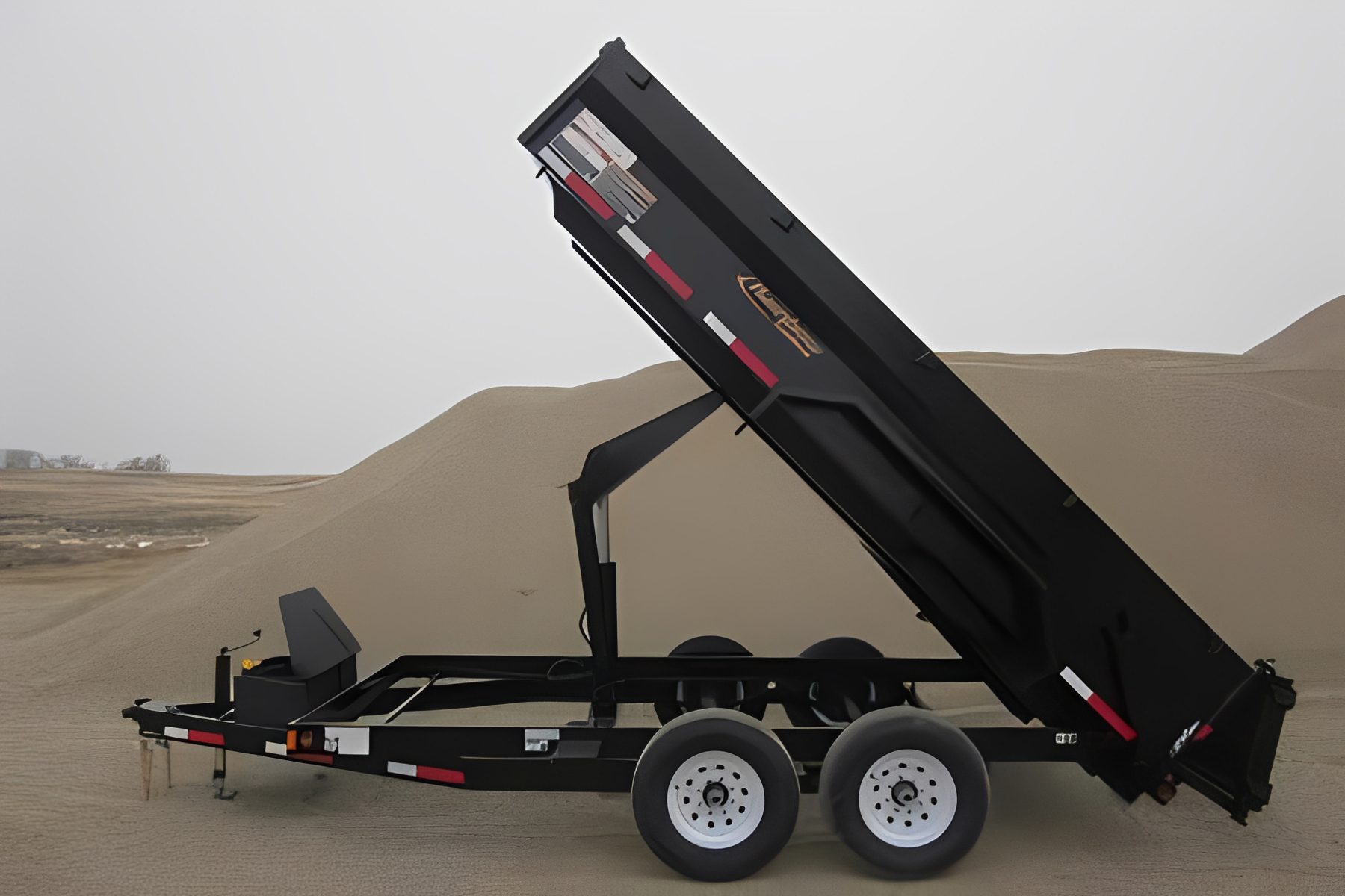 Utility trailer with raised bed