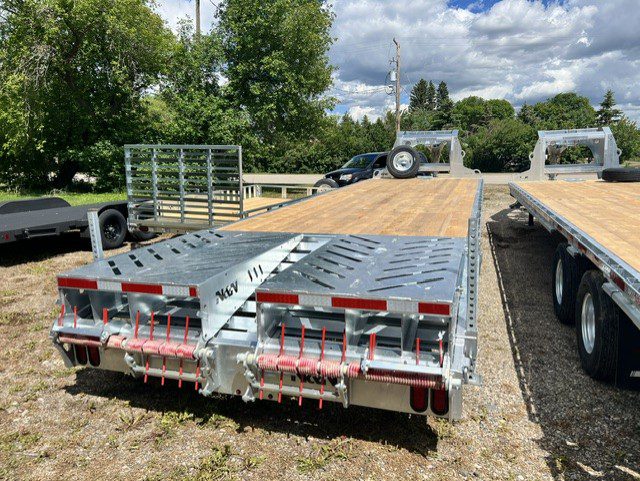 Galvanized gooseneck equipment trailer with wood deck